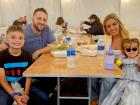 Participants enjoying the St Demetrios Greek Fest in Elmhurst