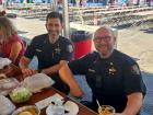 Police officers enjoying the St. Nectarios Greek Fest in Palatine