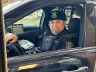 Police officer in drive-thru at Charcoal Delights Restaurant in Chicago Police officer in drive-thru at Charcoal Delights Restaurant in Chicago