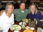 Family enjoying dinner at Jameson's Charhouse in Arlington Heights Family enjoying dinner at Jameson's Charhouse in Arlington Heights