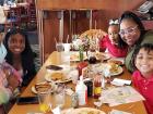 Family enjoying breakfast at Lumes Pancake House Chicago Family enjoying breakfast at Lumes Pancake House Chicago