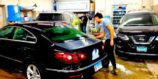 Hard working crew at Athenian Body Shop in Chicago Ridge