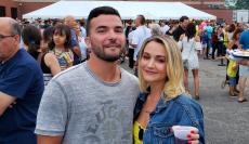 Couple enjoying the Big Greek Food Fest in Niles at St. Haralambos Greek Orthodox Church