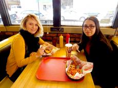 Friends enjoying lunch at Burger Baron Restaurant in Chicago Friends enjoying lunch at Burger Baron Restaurant in Chicago