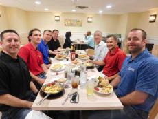 Friends enjoying breakfast at Eggs Inc. Cafe in Chicago