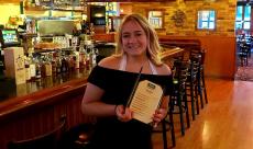 Customer enjoying early lunch at Johnny's Kitchen & Tap in Glenview