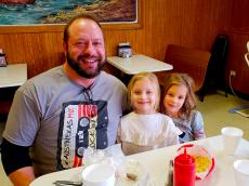 Family enjoying lunch at Nick's Drive-In Chicago Family enjoying lunch at Nick's Drive-In Chicago