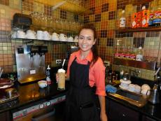 Friendly server with Greek Frappe at Papagalino Cafe & Pastry Shop in Niles