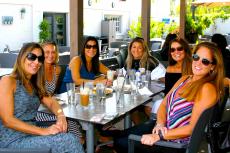 Friends enjoying lunch at Plateia Mediterranean Kitchen & Bar in Des Plaines