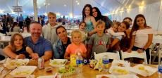 Family enjoying the St Demetrios Greek Fest in Elmhurst